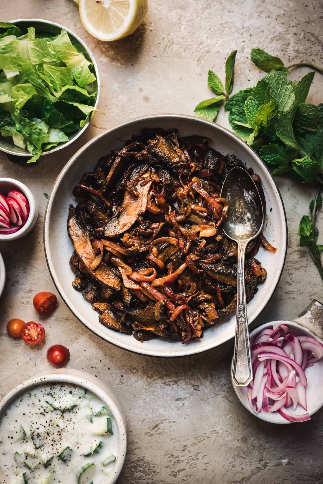 cooked vegan mushroom shawarma with seasoning in a bowl