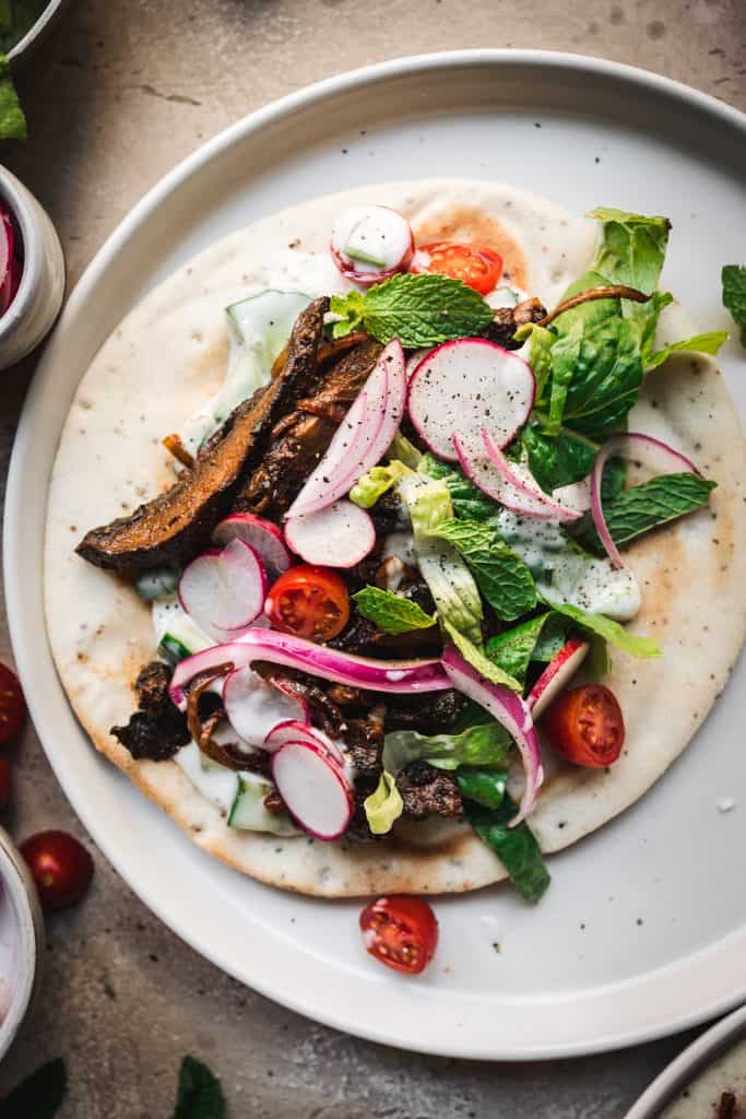 close up view of vegan shawarma on a gluten free pita
