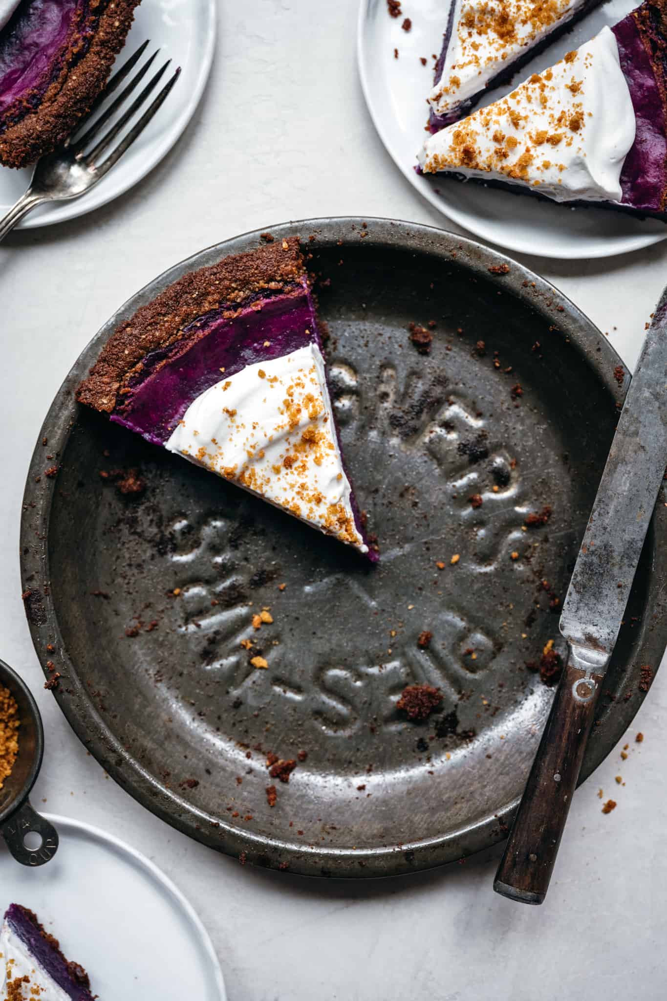 overhead view of purple sweet potato pie in antique pie pan