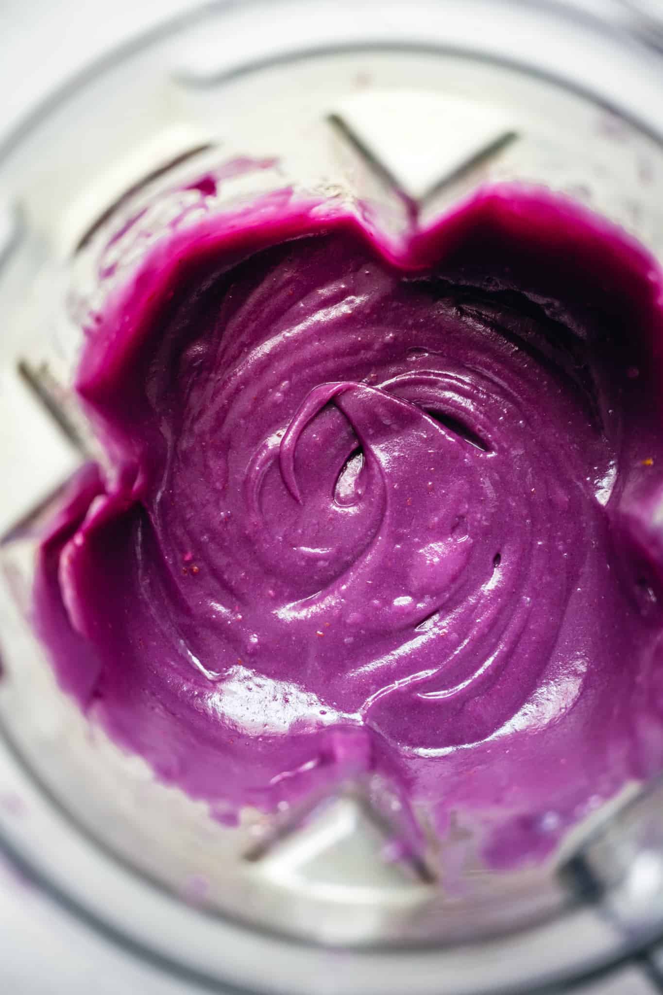 Overhead view of purple sweet potato pie filling in blender