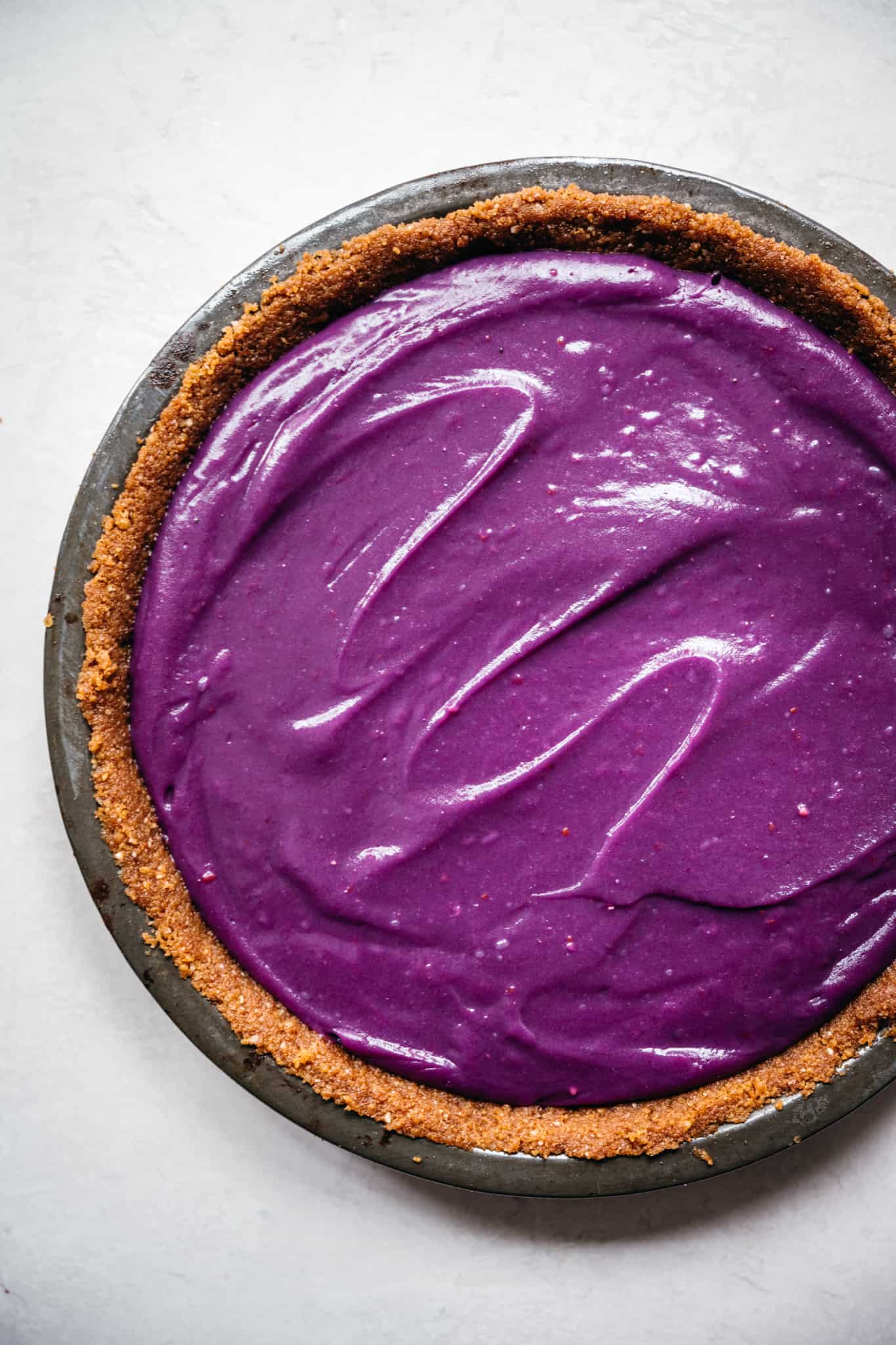 overhead view of beautiful vibrant purple pie filling