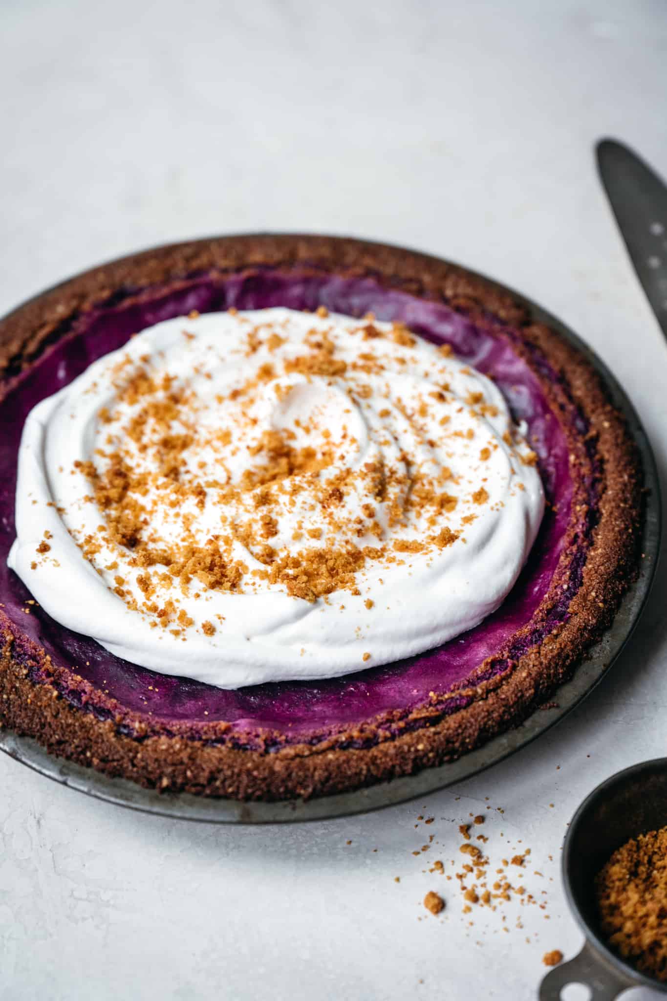 side view of whole purple sweet potato pie