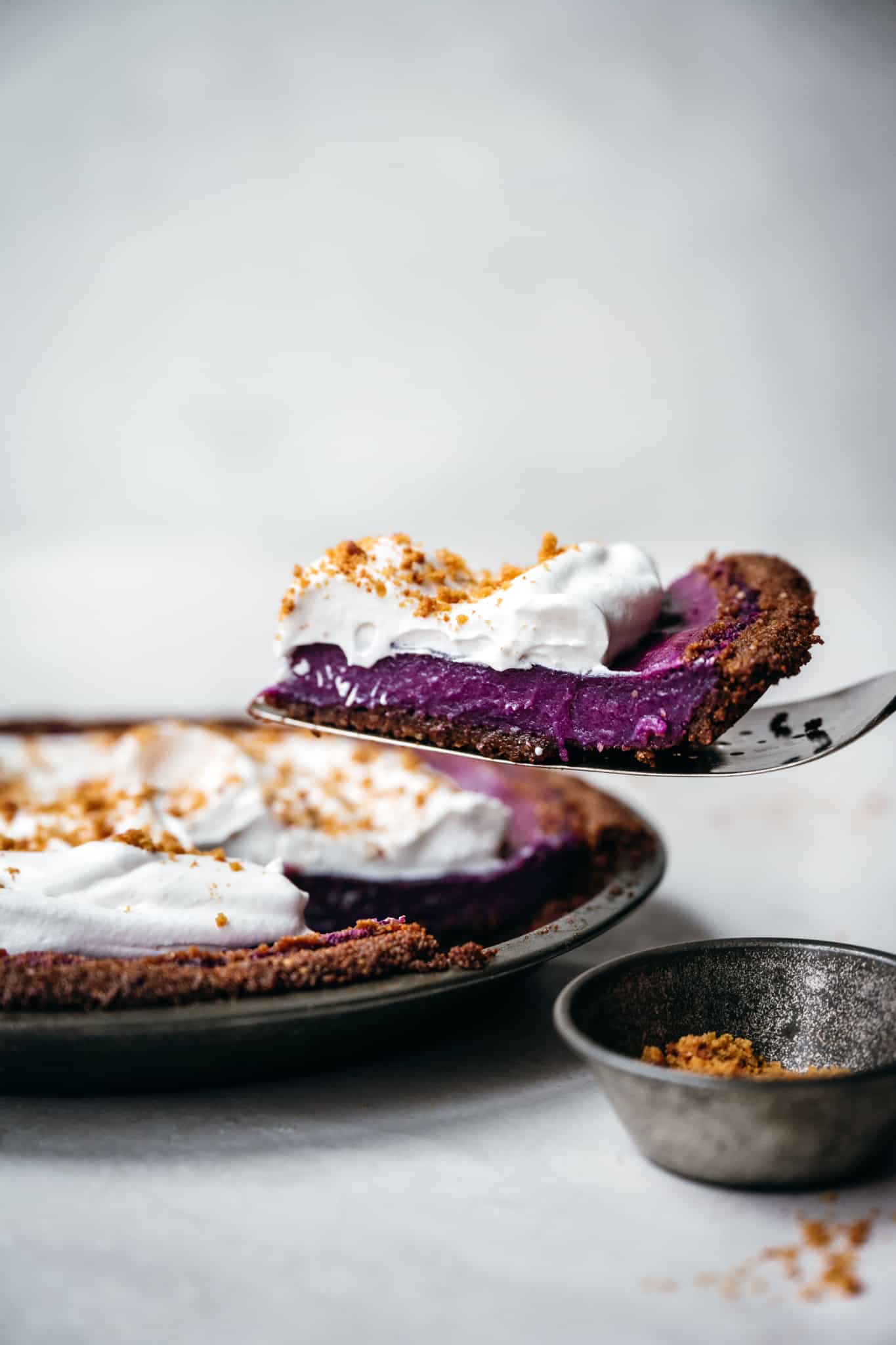 side view of slice of vegan purple sweet potato pie