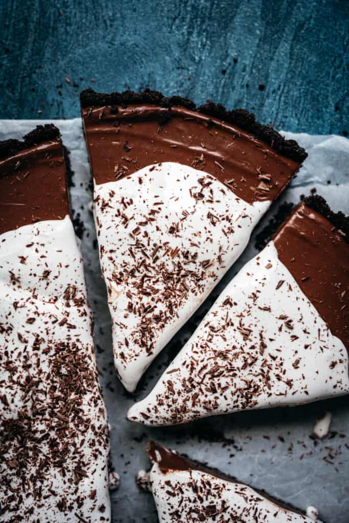 close up overhead view of chocolate pie with whipped cream