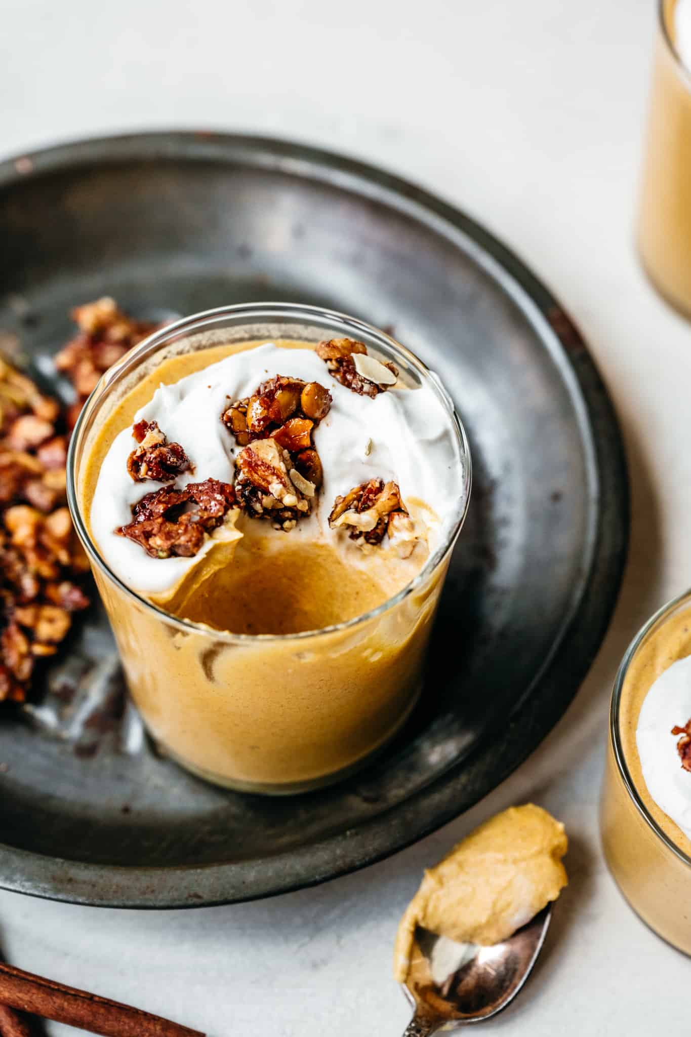 Jar of vegan pumpkin mousse with spoon