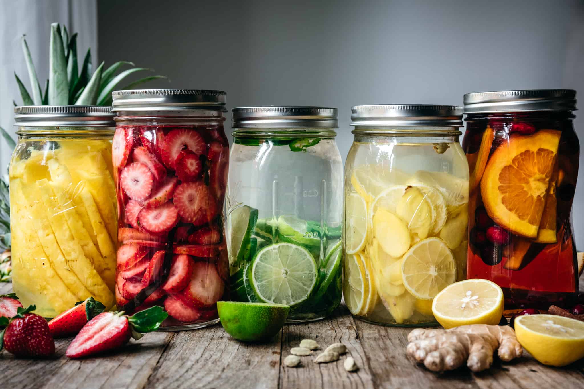 side view of homemade fruit infused liquors