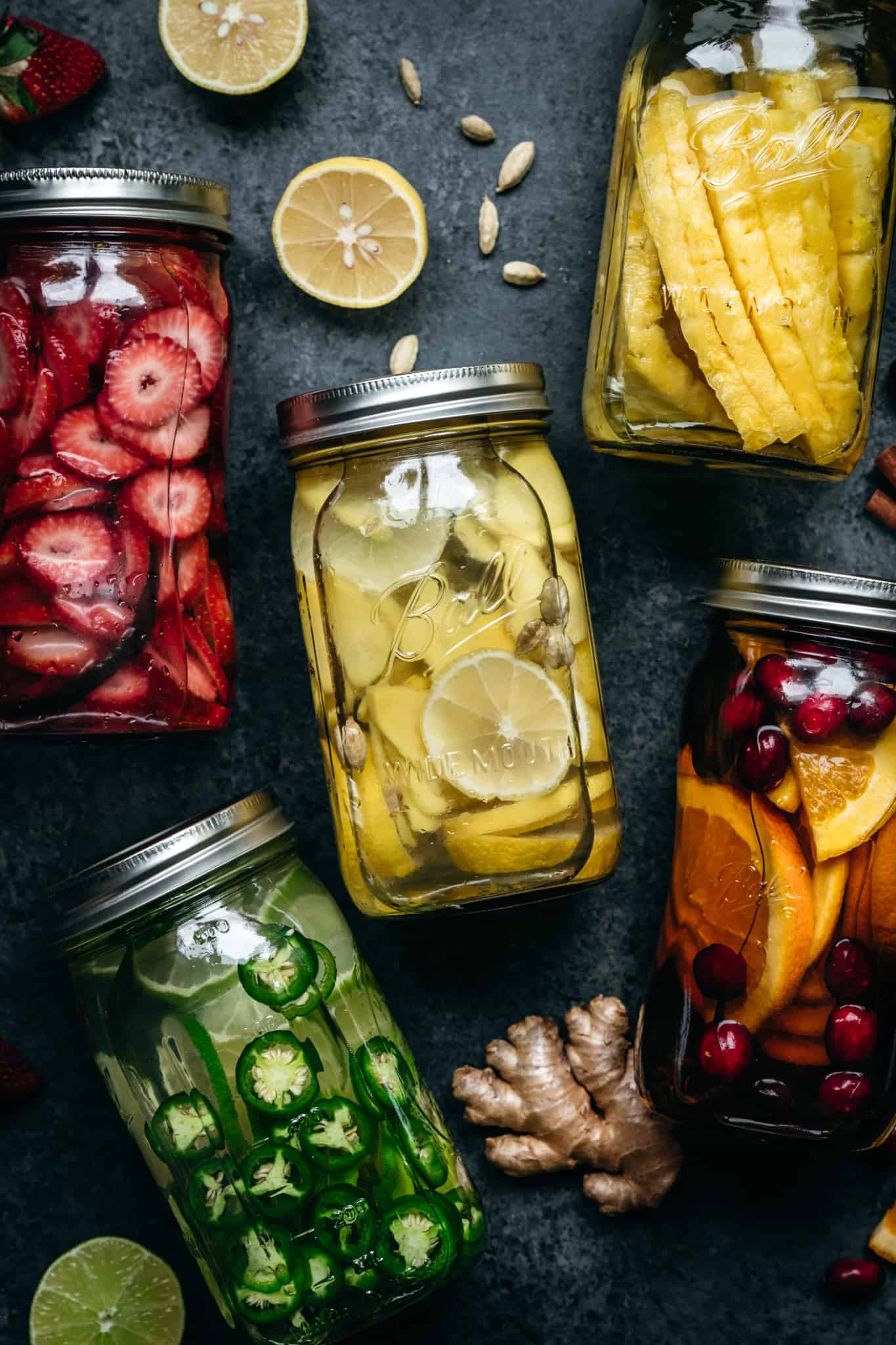 overhead view of 5 different types of infused liquors 