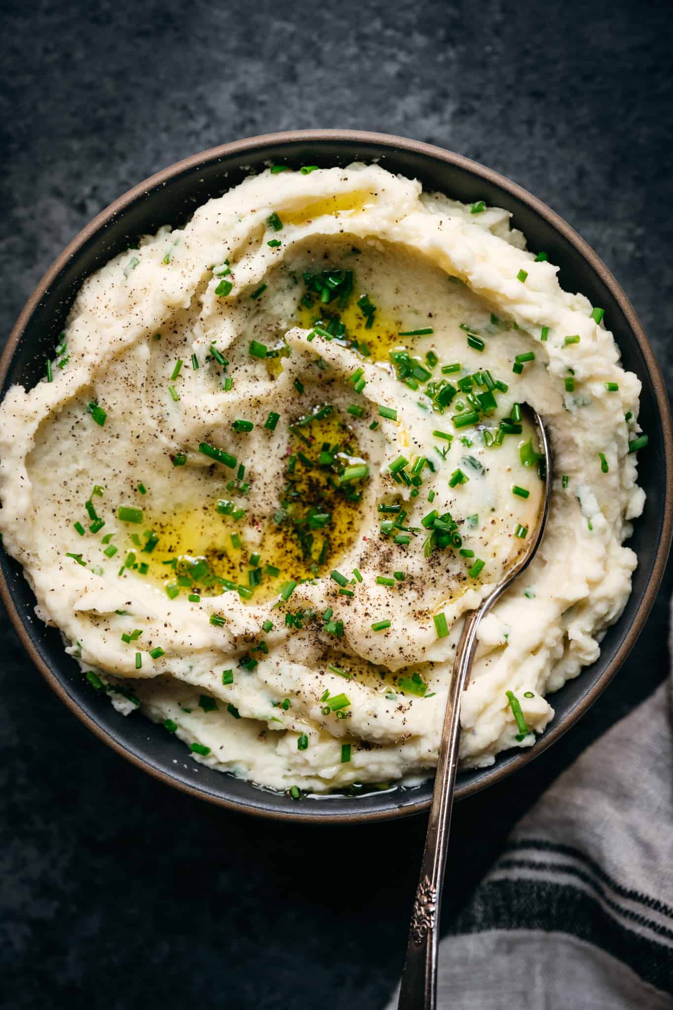 overhead view of vegan sour cream and chives mashed potatoes