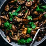 overhead of pan seared wild mushrooms in a bowl
