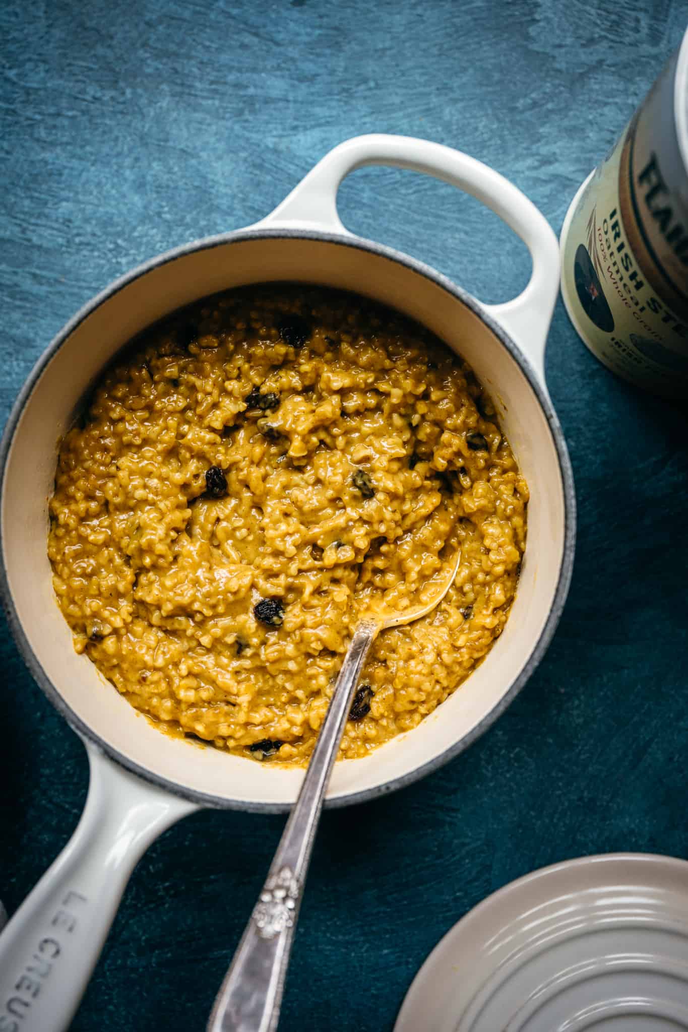 overhead view of indian-spiced oatmeal in a small saucepan