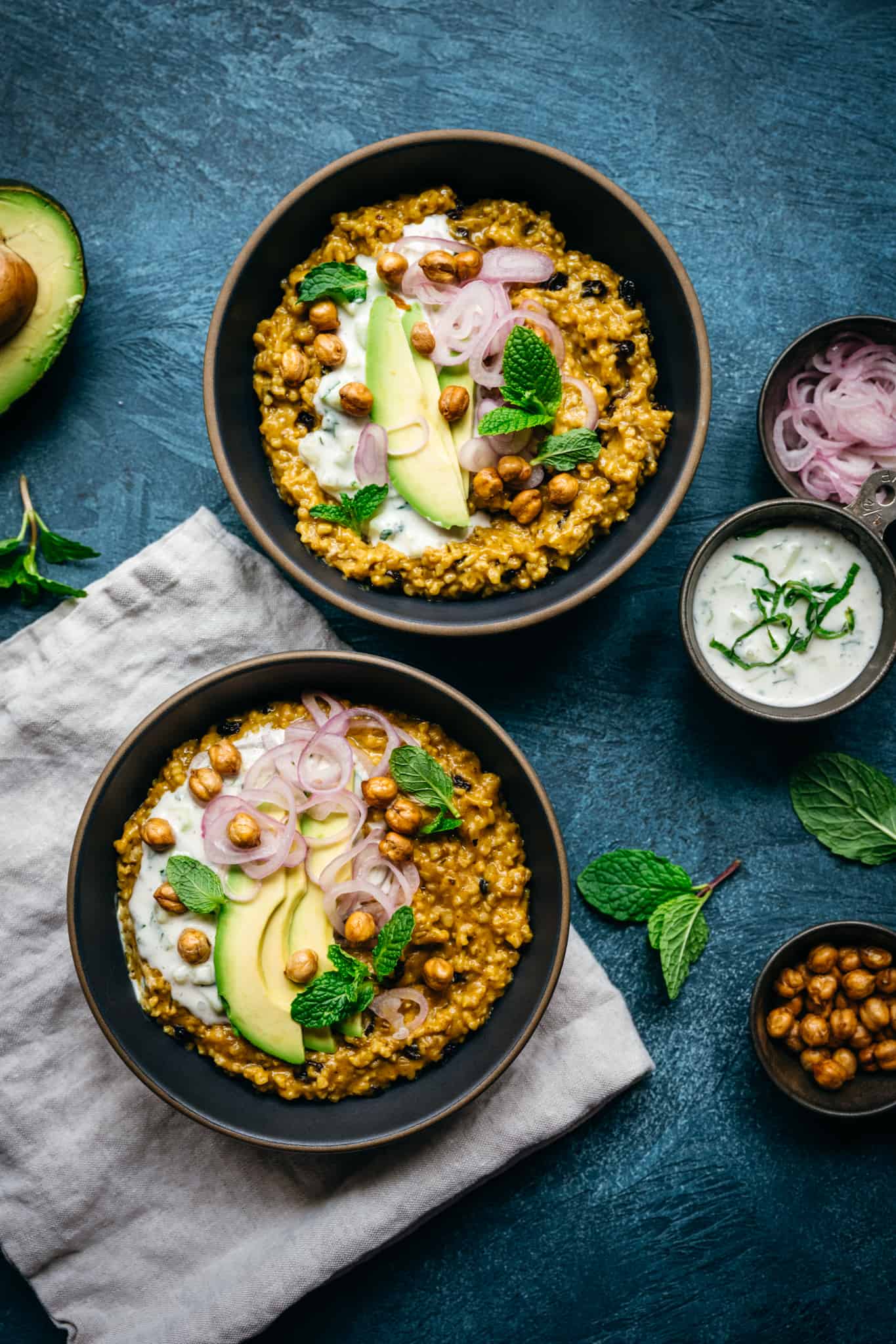 overhead view of two bowls of savory steel cut oats 