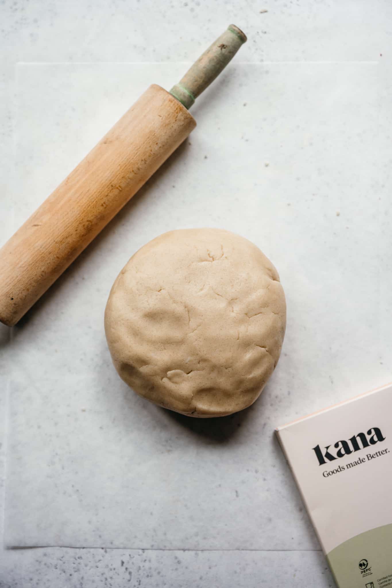 overhead view of vegan sugar cookie dough with rolling pin