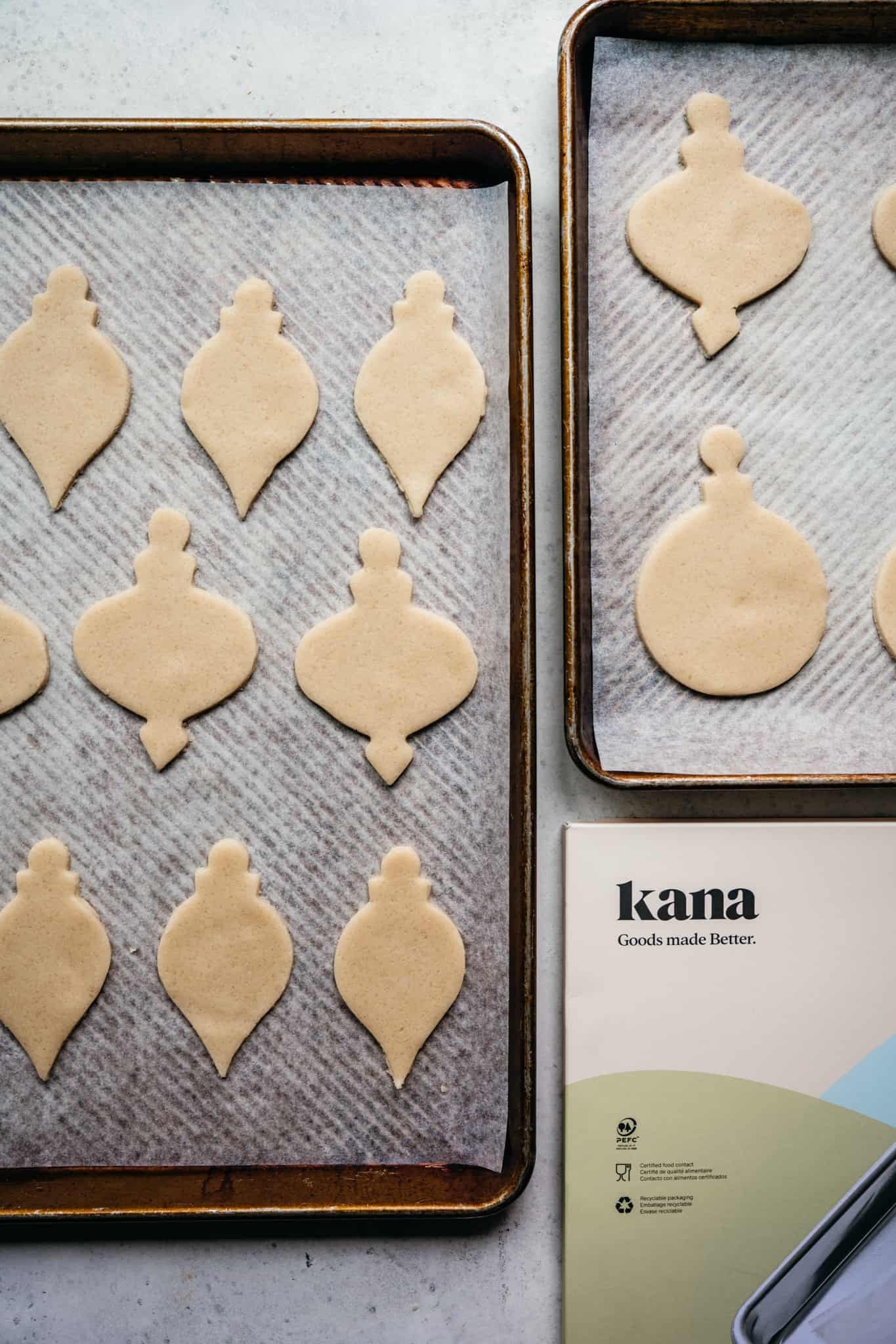 overhead view of vegan sugar cookies before baking on sheet pans