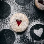 One linzer cookie with a heart seen from above.