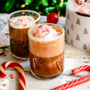 Close up of finished peppermint mochas in festive glasses.