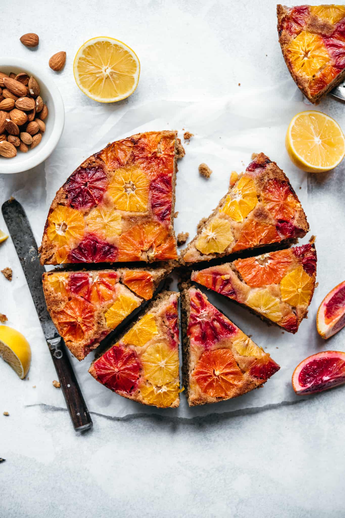 overhead view of whole orange olive oil cake slices