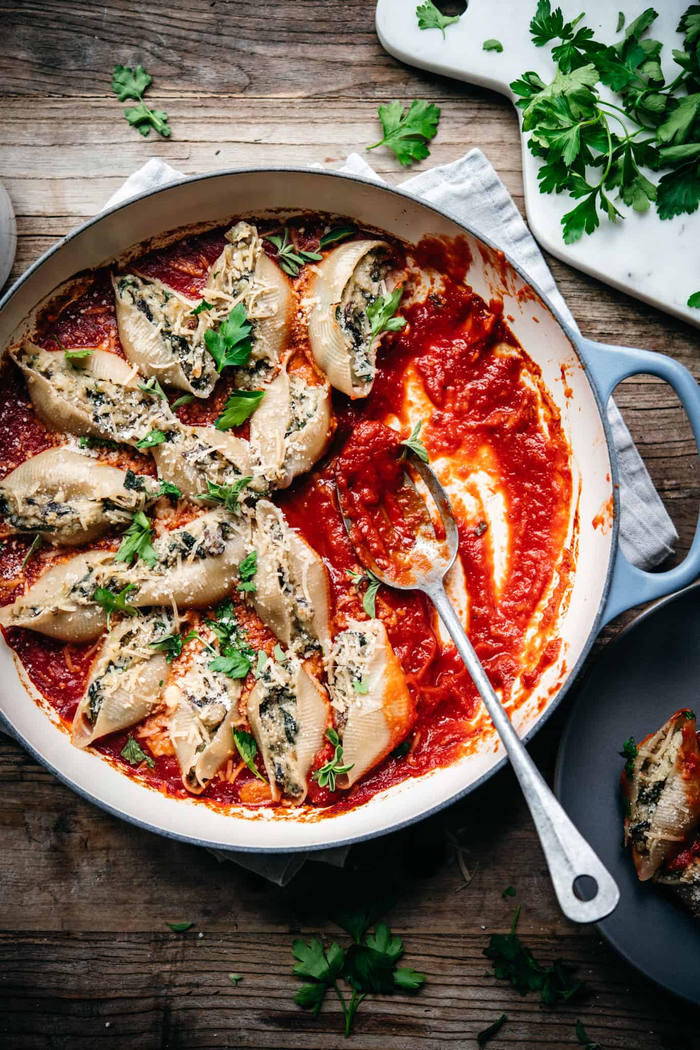 overhead view of vegan stuffed shells in marinara sauce