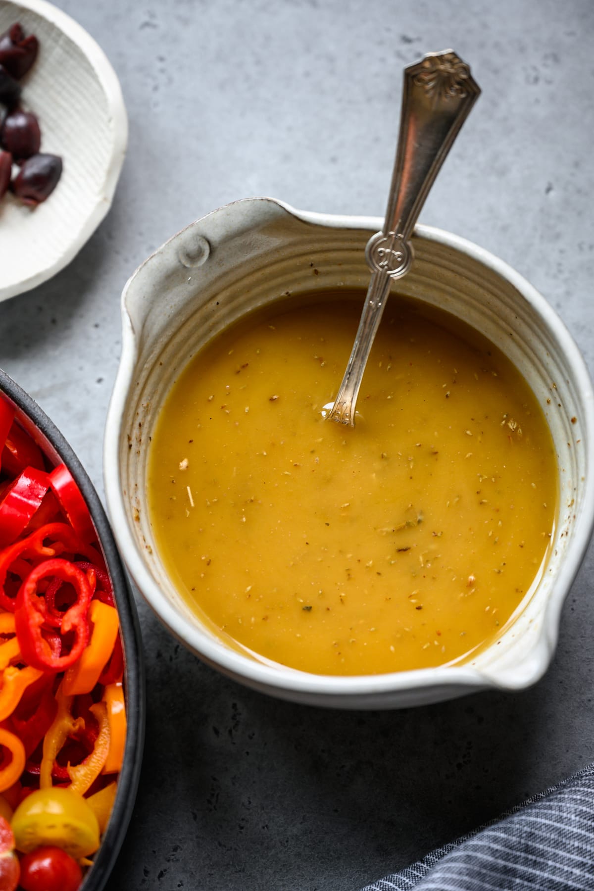 close up view of homemade greek salad dressing in a bowl