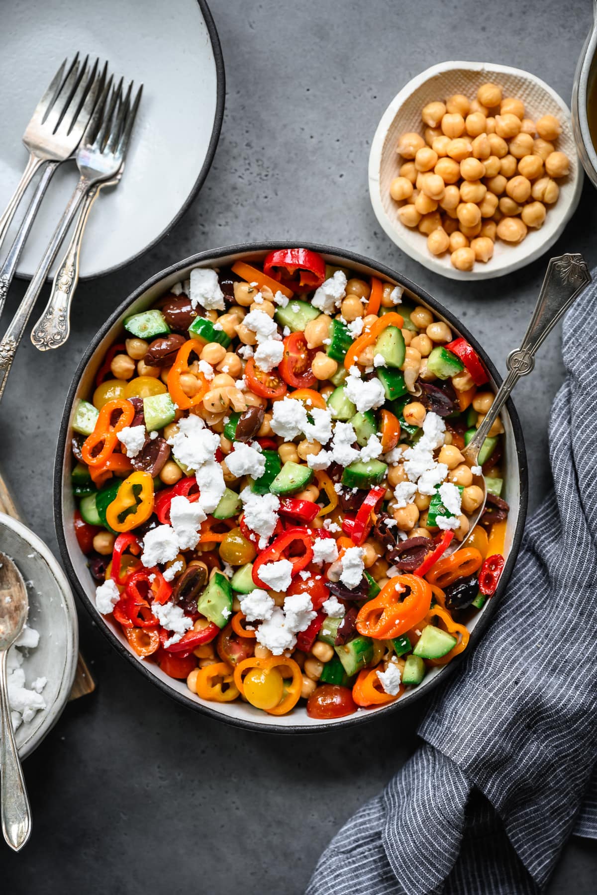overhead view of vegan greek chickpea salad in bowl