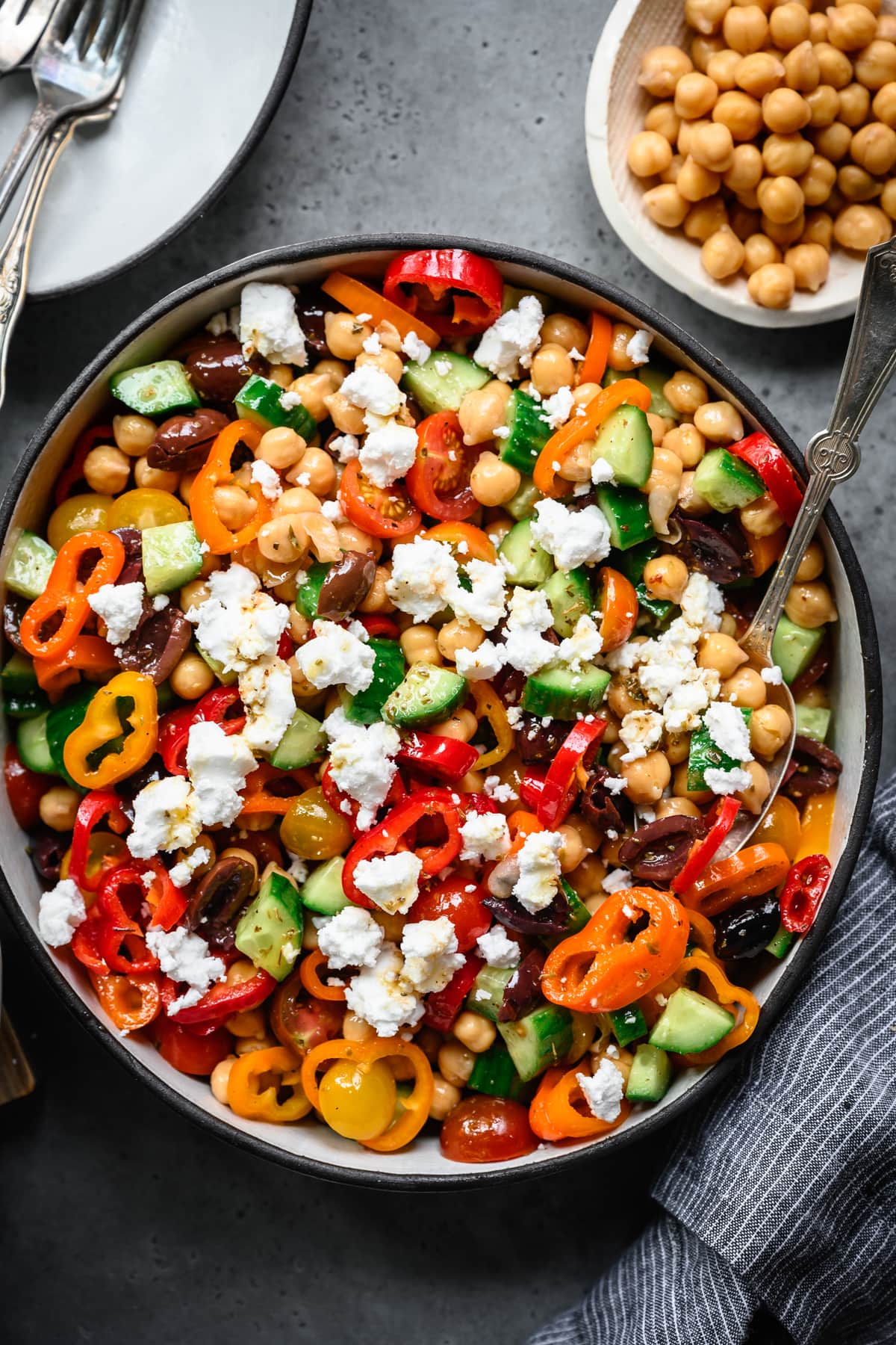 close up overhead view of vegan greek chickpea salad in bowl