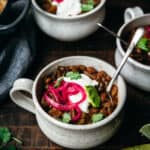 Pinto bean chili seen from above in a cup.