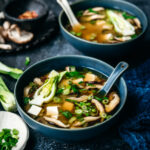 Three bowls of miso soup seen from above.