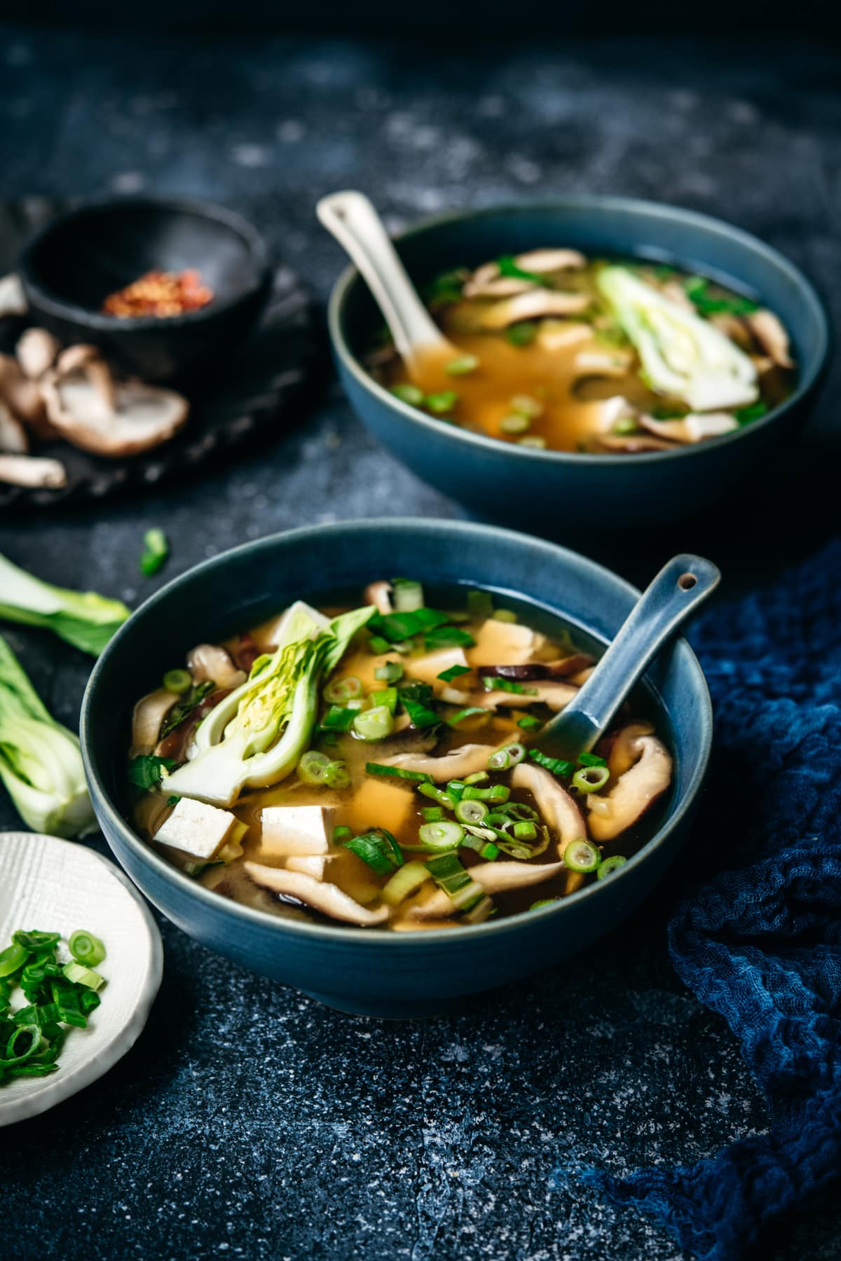 Overhead view of two bowls of vegan miso soup.