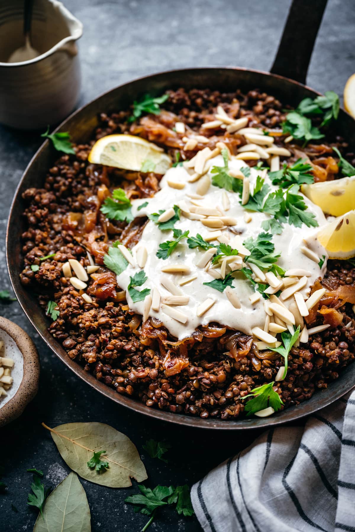 side view of vegan lentil and quinoa mujadara in a pan