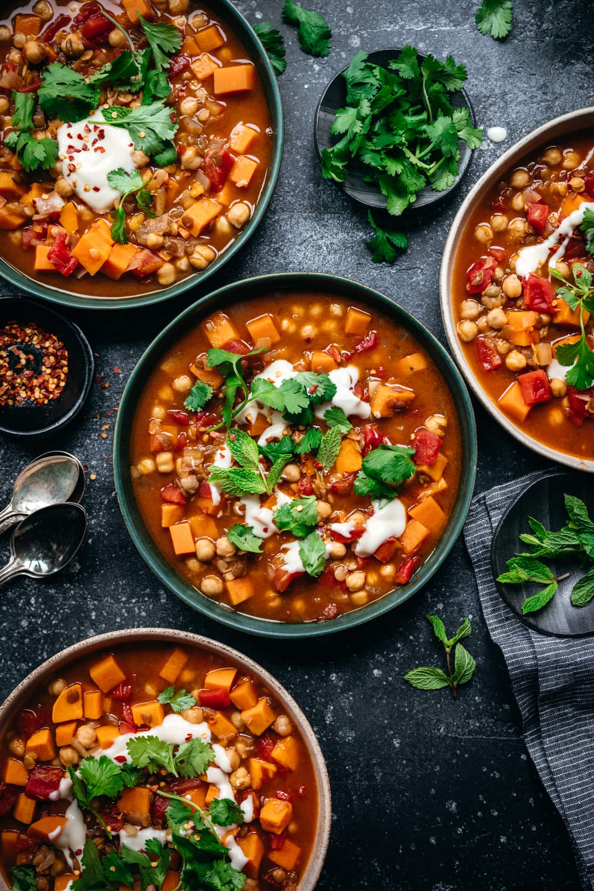 overhead view of vegan Moroccan chickpea lentil stew in bowl