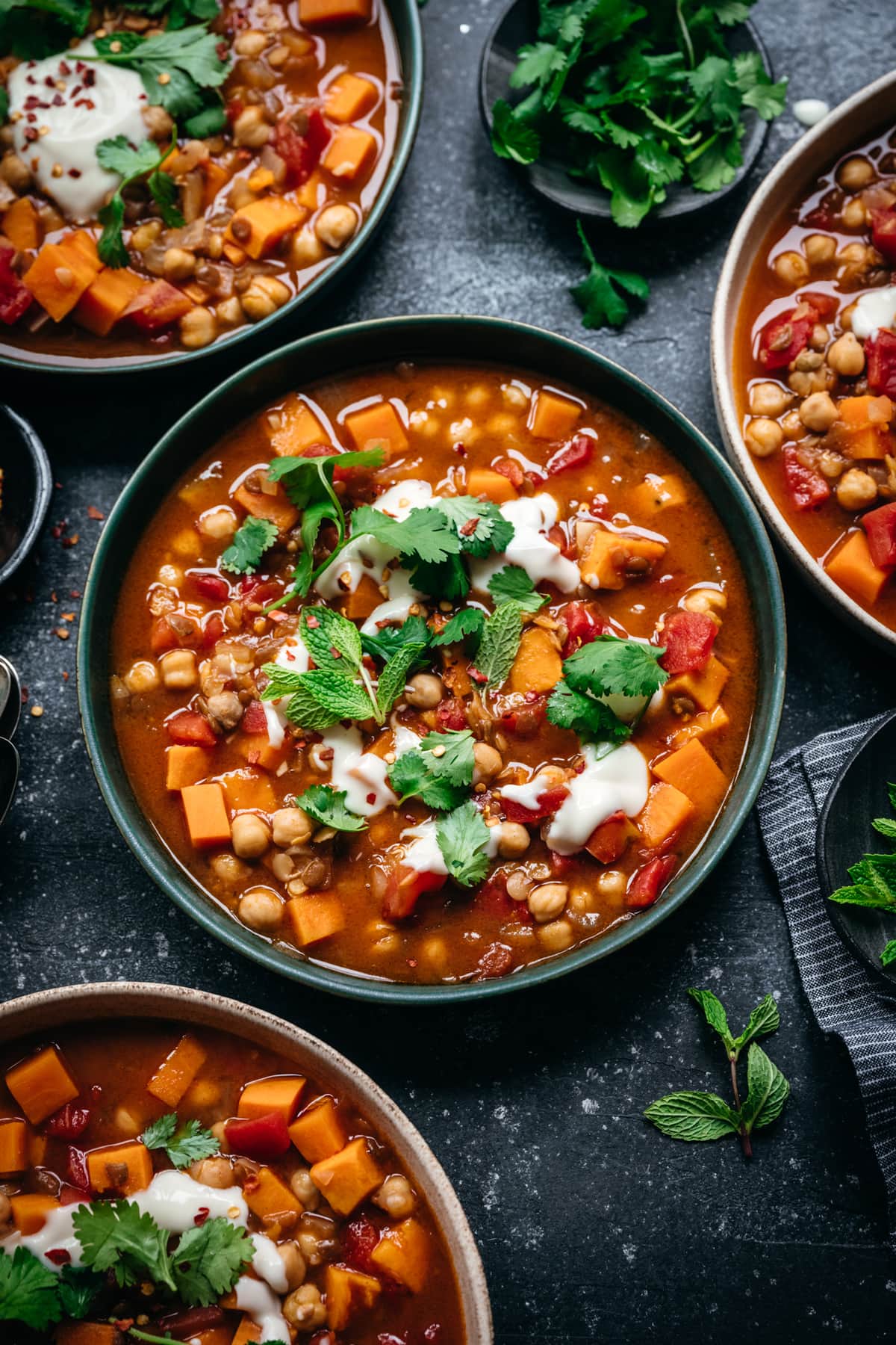 overhead view of vegan Moroccan chickpea lentil stew in bowl