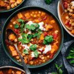 Bowl of lentil stew seen from above.