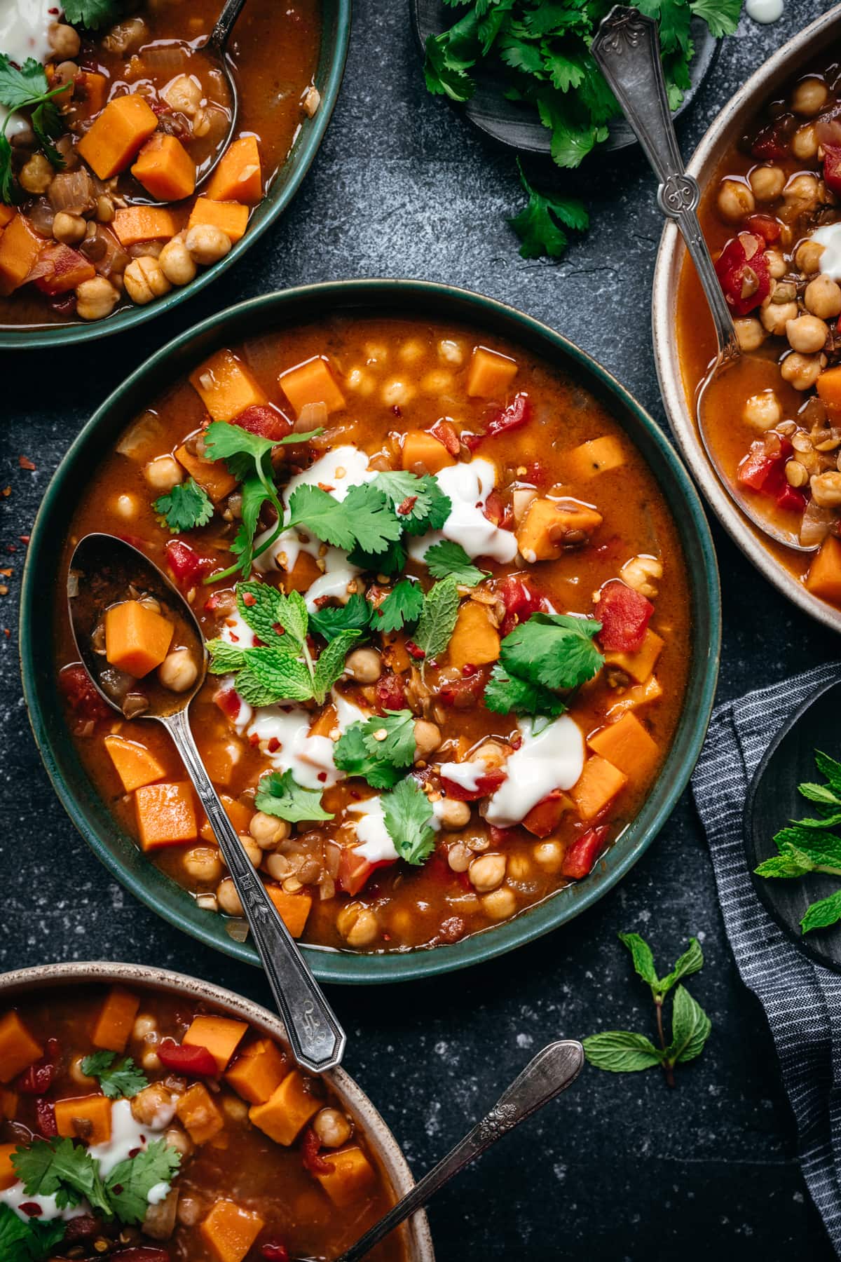 overhead view of vegan Moroccan chickpea lentil stew in bowl