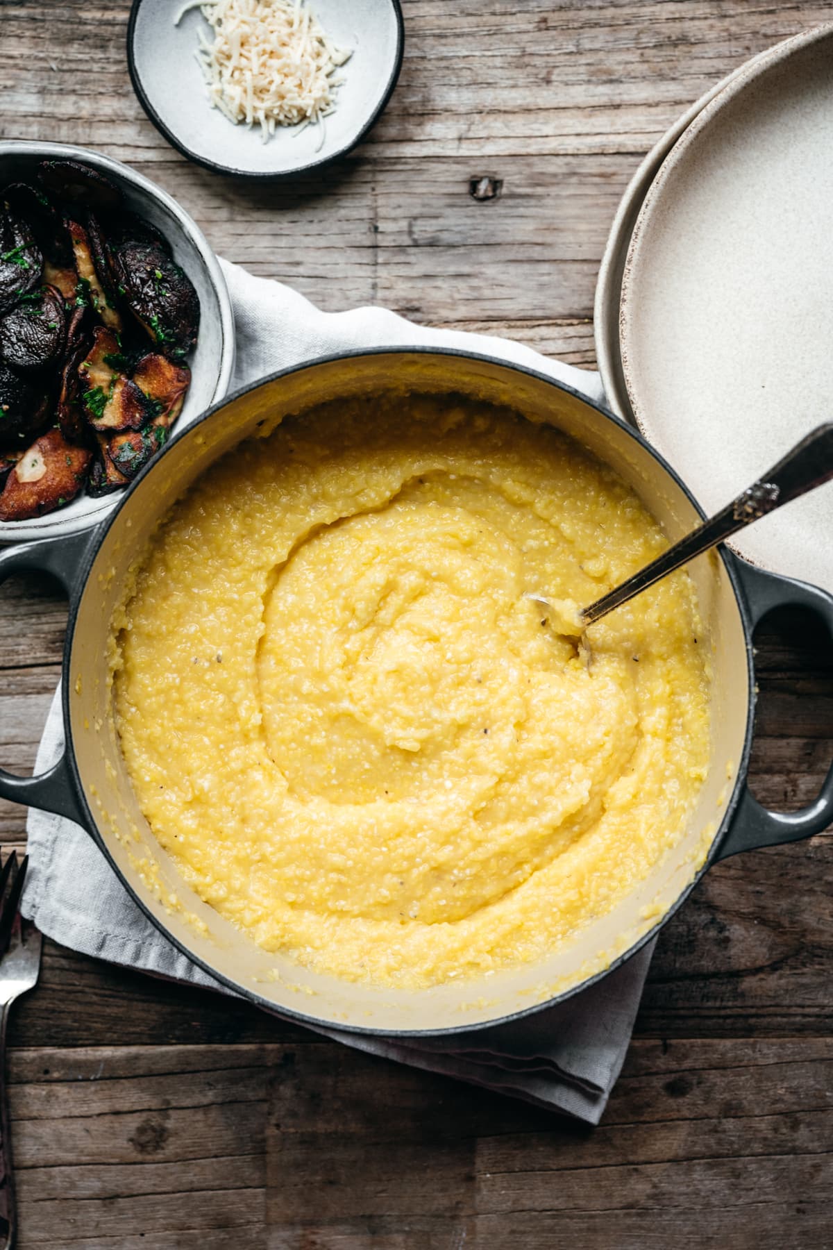 overhead view of creamy vegan polenta in pot