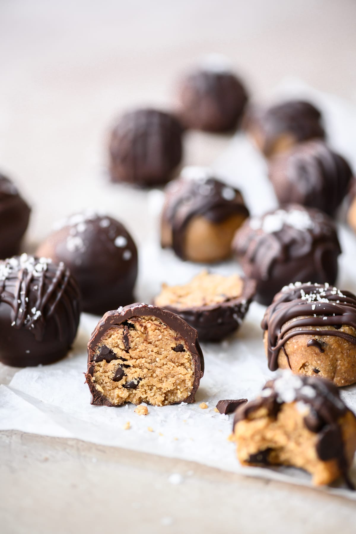 side view of edible vegan peanut butter cookie dough bite cut in half