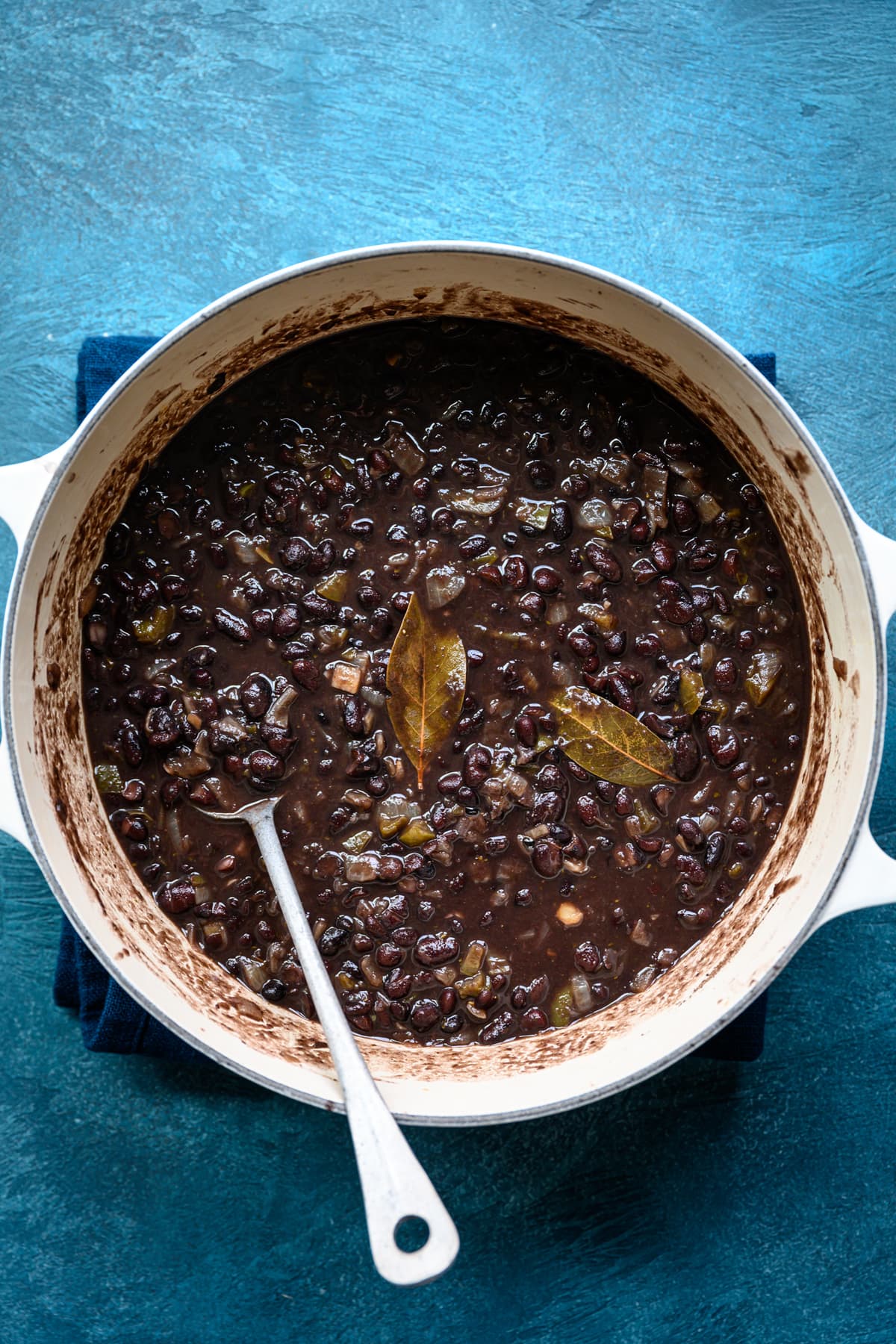 overhead view of vegetarian cuban black beans in large pot