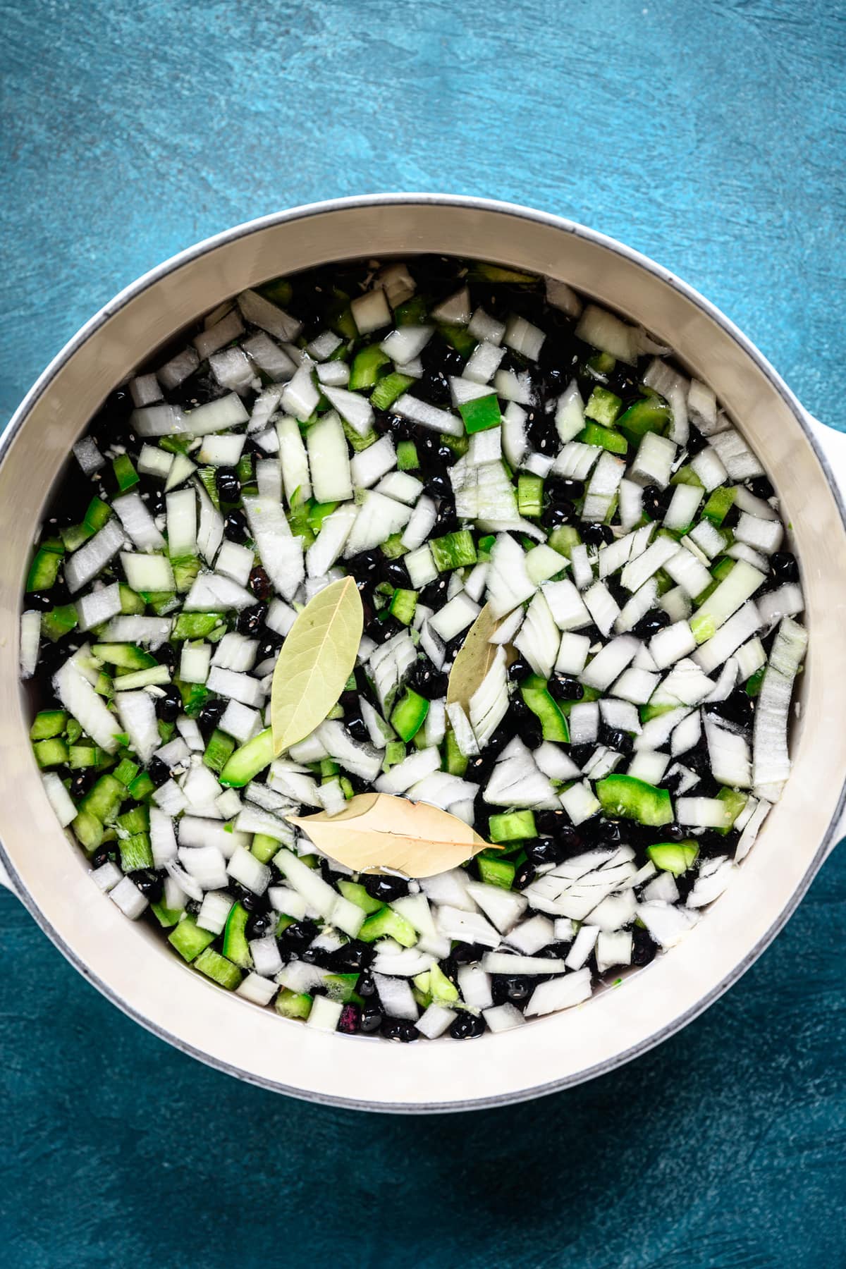 overhead view of uncooked vegan cuban black beans in pot