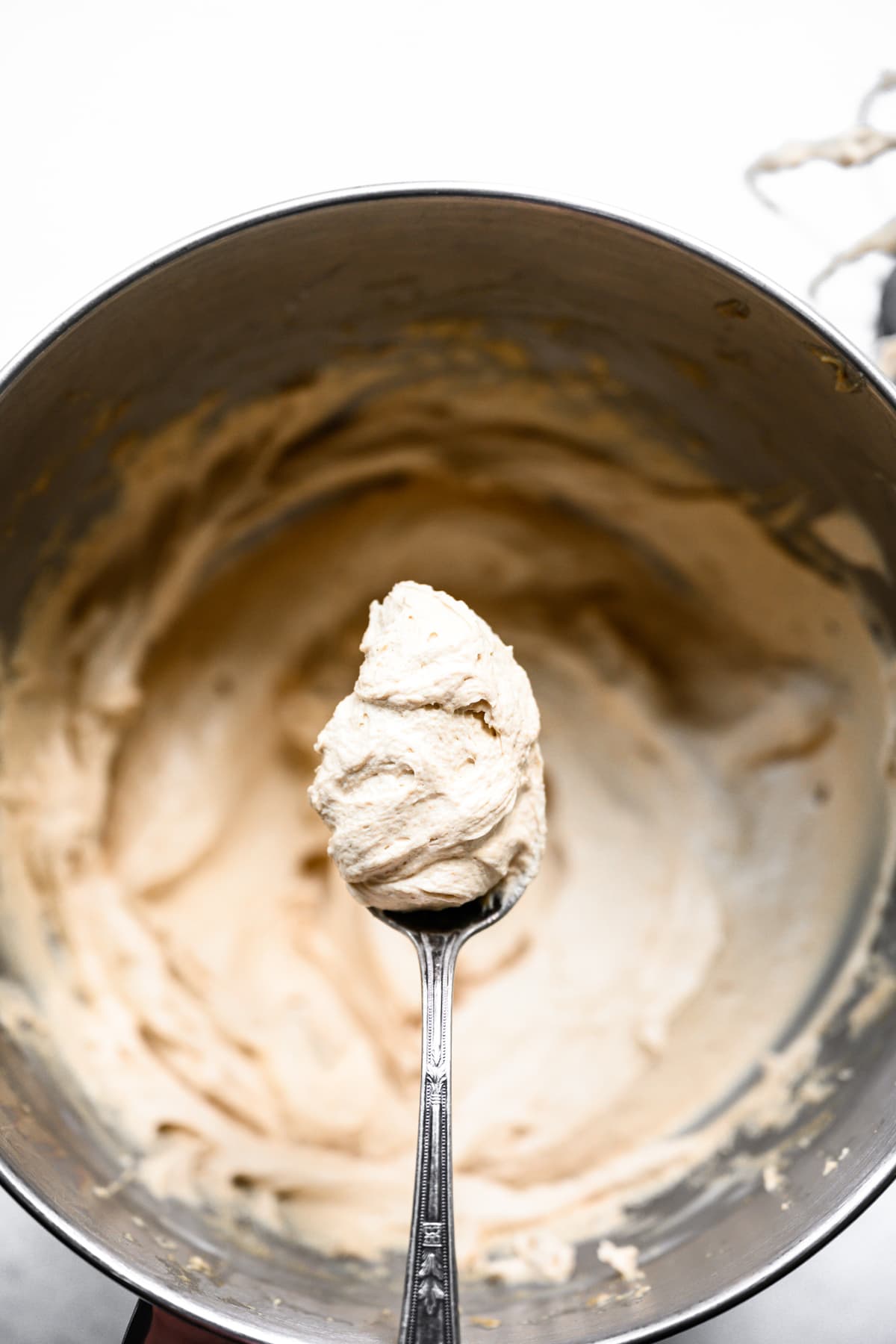 close up view of vegan peanut butter mousse on a spoon