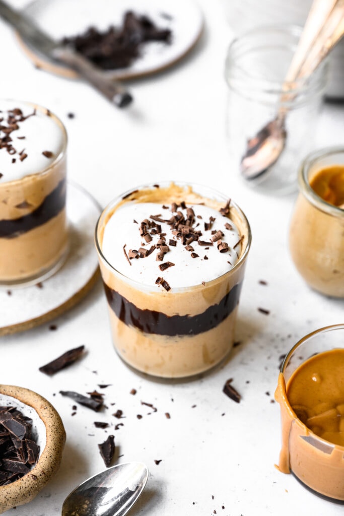 side view of vegan chocolate peanut butter mousse in glass jar