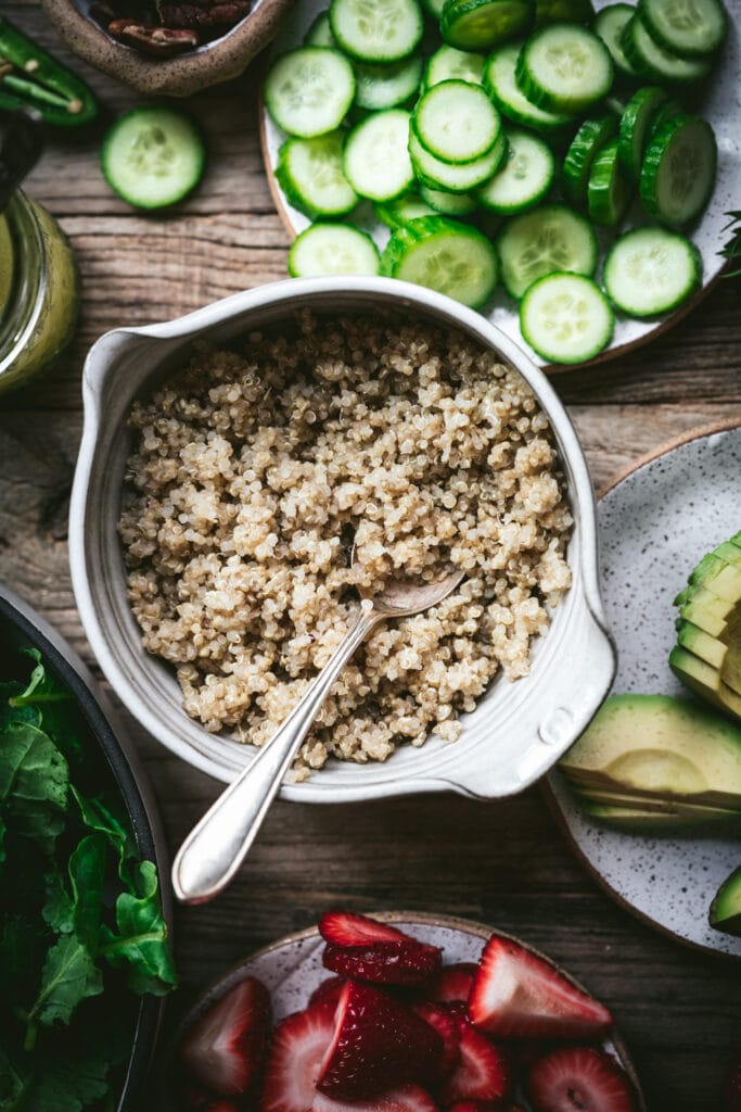 close up overhead view of quinoa in a small white bowl