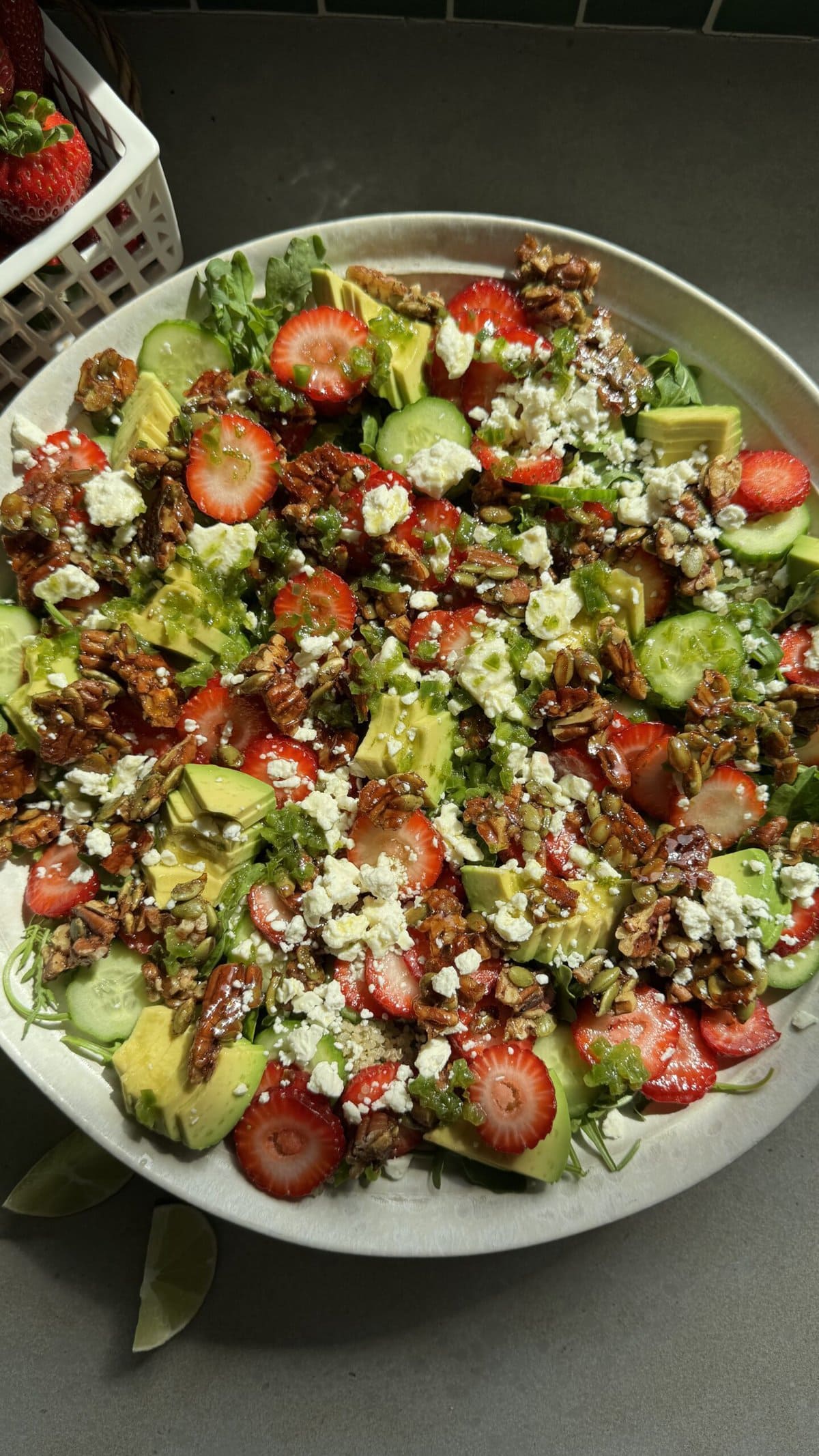 Overhead view of strawberry salad with brittle.
