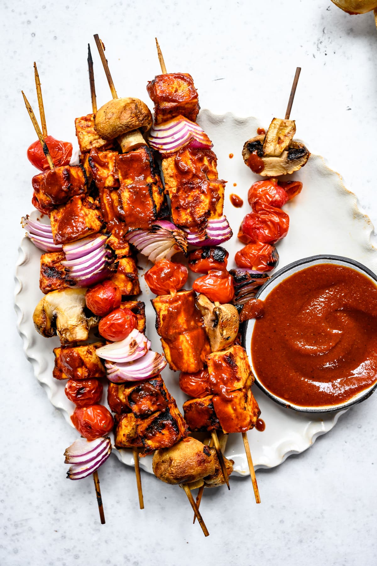 bbq grilled tofu kebabs on a plate