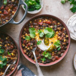 Black bean soup in a bowl seen from above.