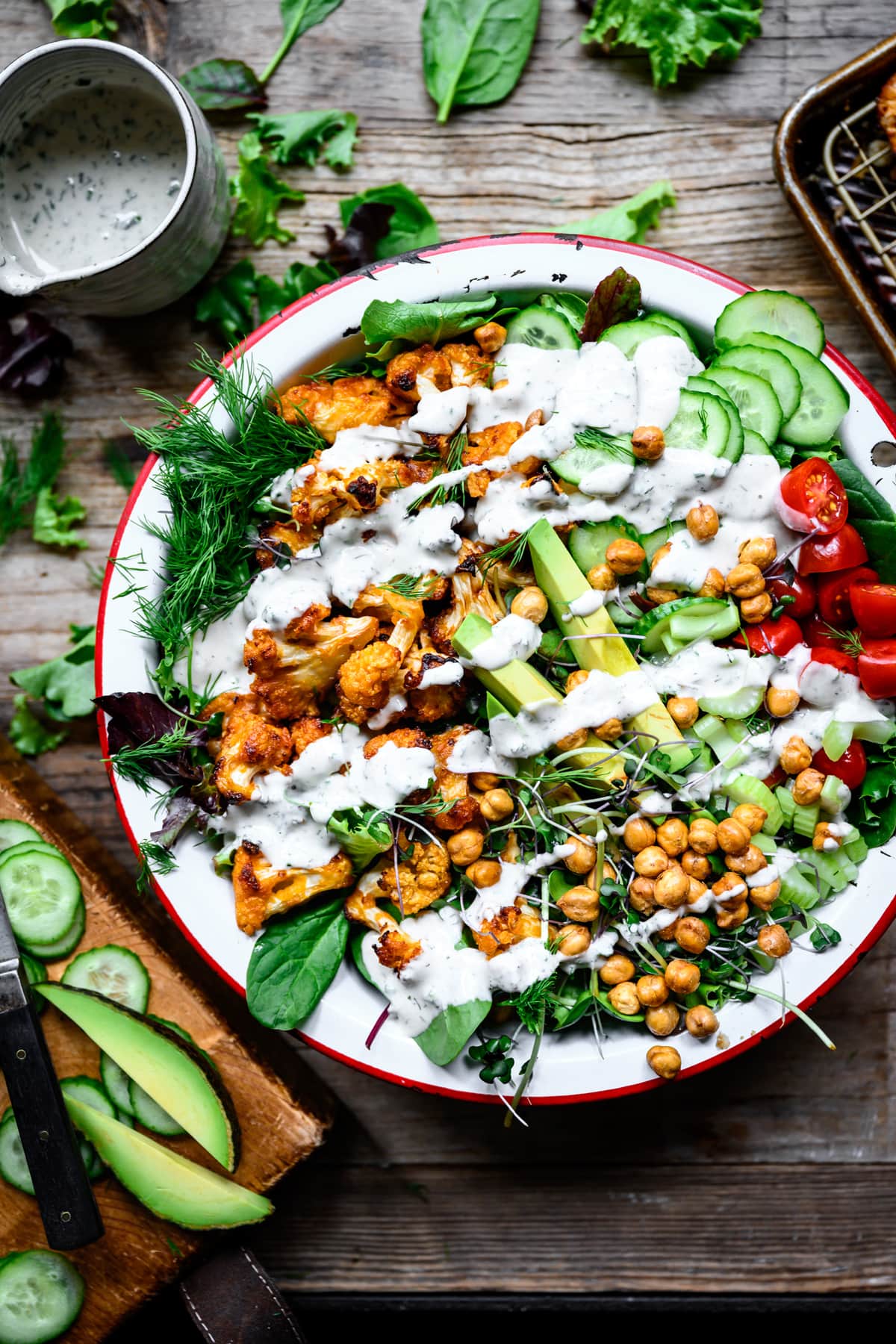 overhead view of vegan buffalo cauliflower salad with ranch