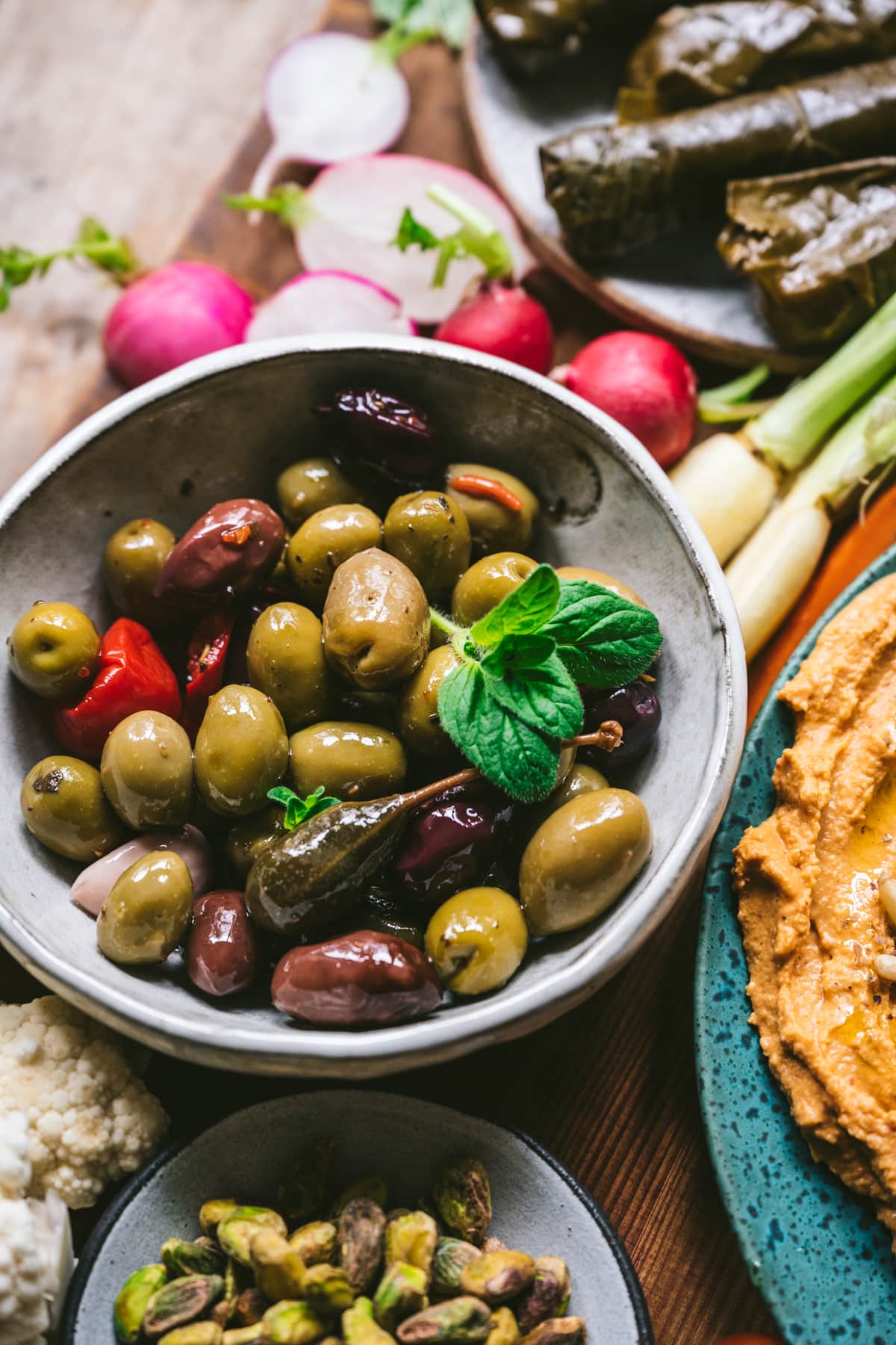 close up view of marinated mixed olives on Mezze platter