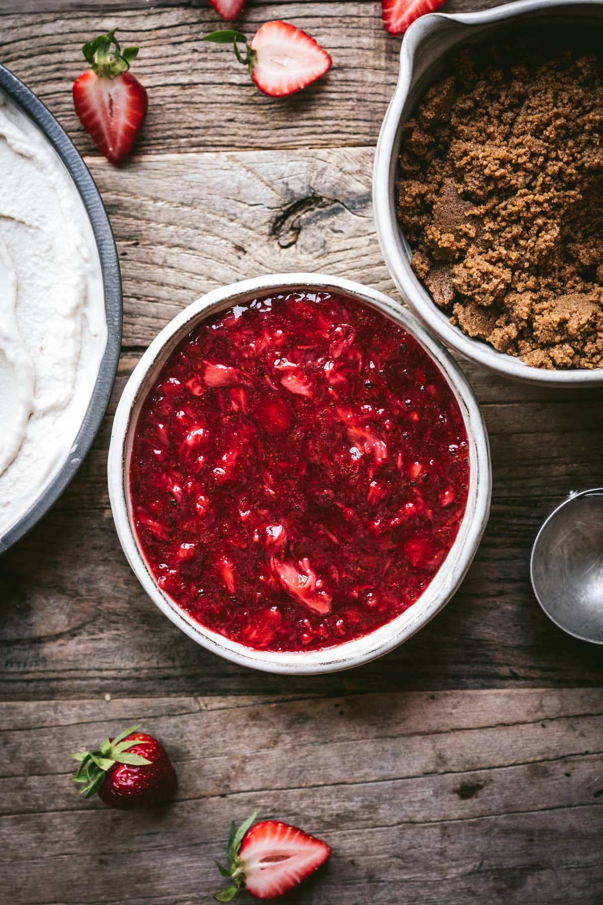 overhead view of strawberry jam filling for ice cream