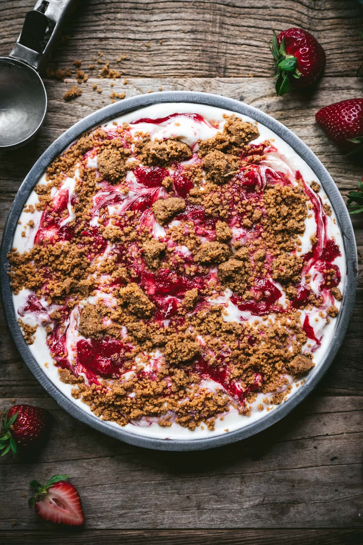 overhead view of vegan strawberry cheesecake ice cream in pan