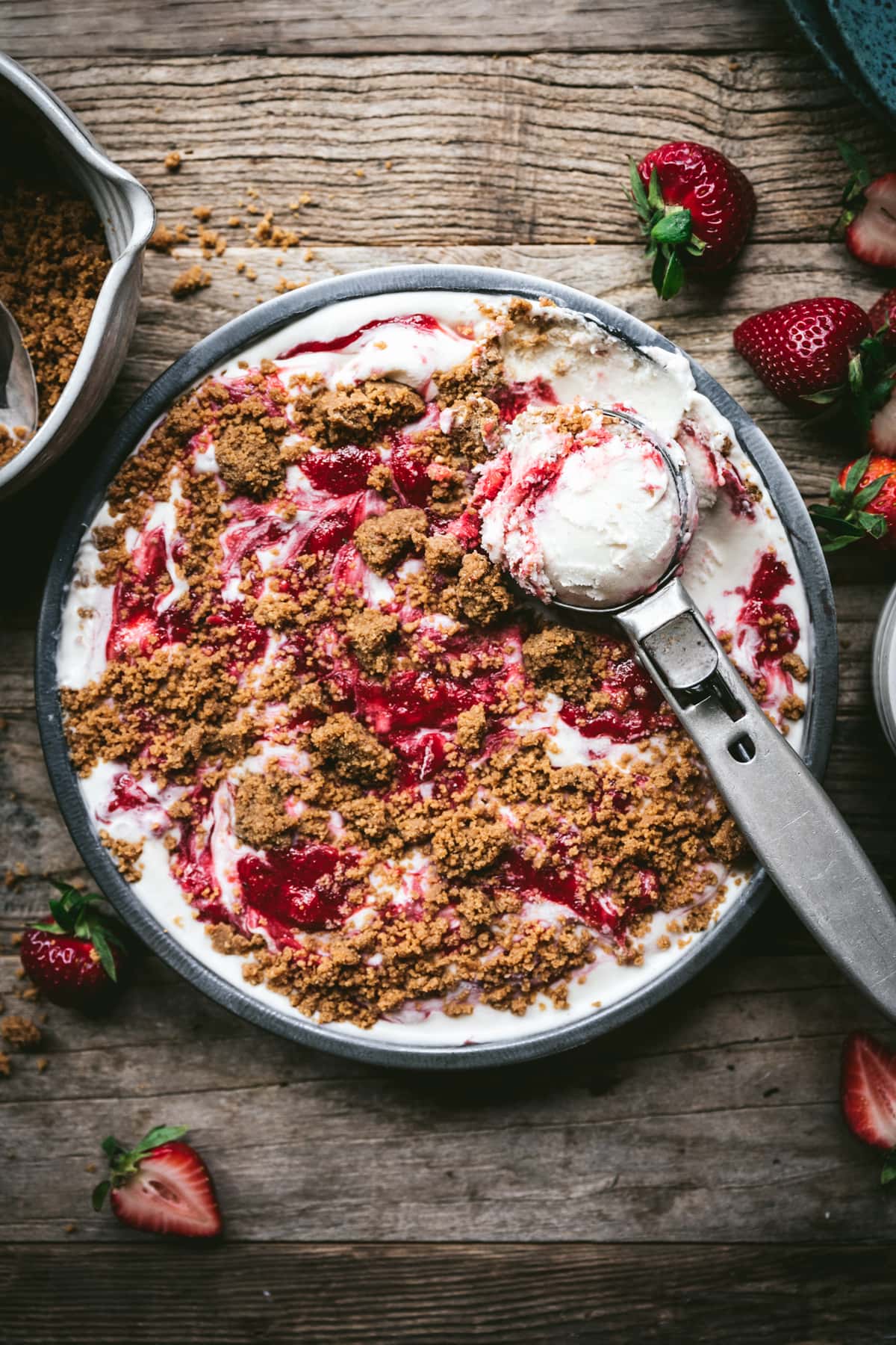 overhead view of vegan strawberry cheesecake ice cream in pan