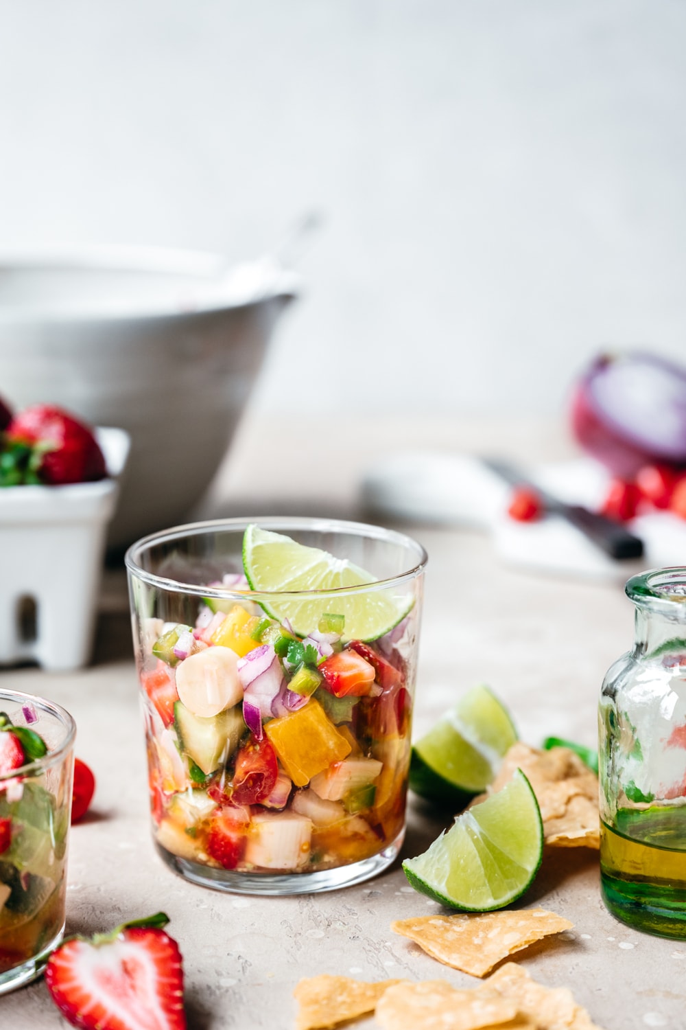 side view of vegan ceviche in a glass jar with lime slice