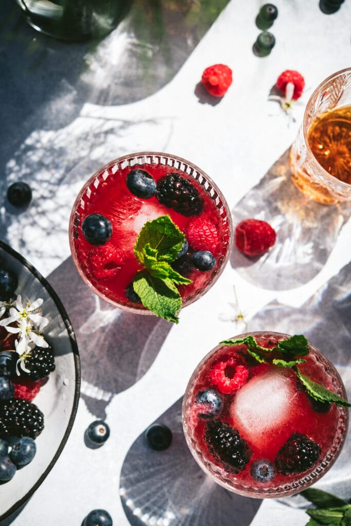 overhead view of berry bourbon cocktail