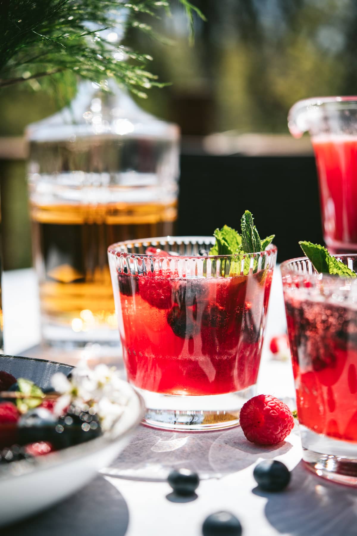 side view of berry bourbon lemonade cocktail